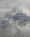Clouds creating shadows in the snow